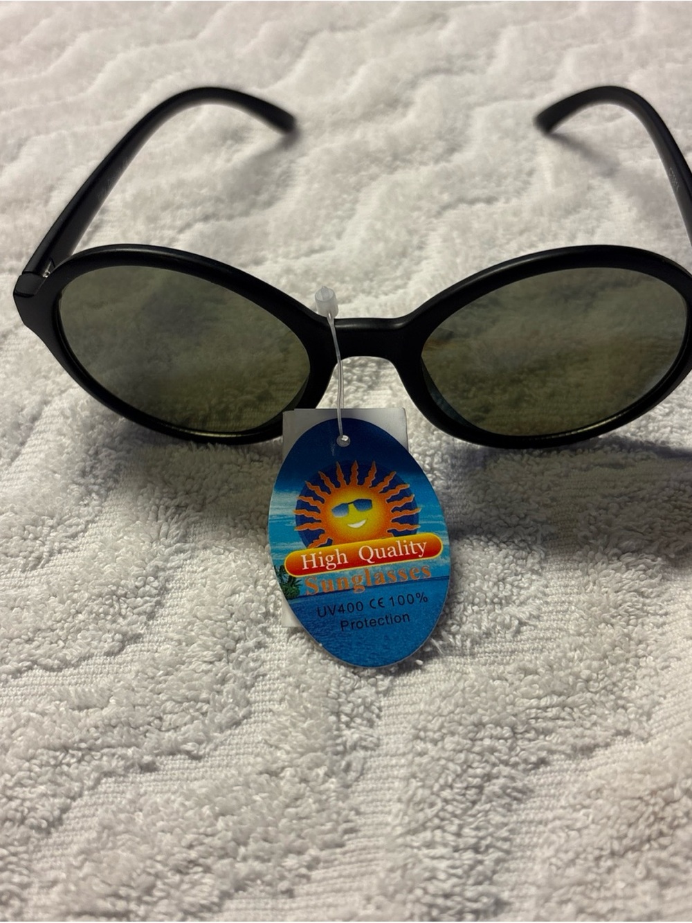 Black Round Sunglasses with Green Lenses